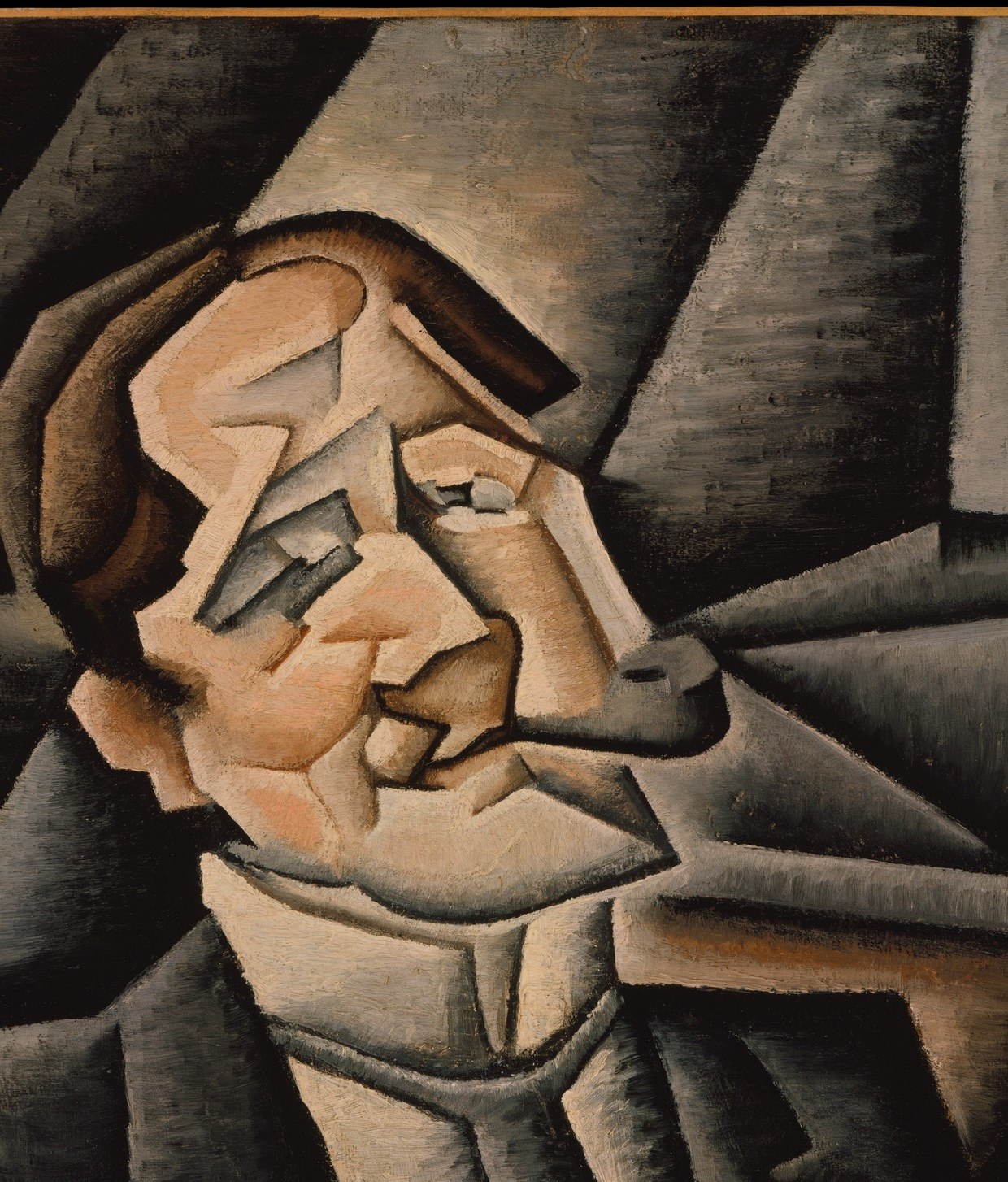 He builds the head from sharp, tilted planes.
