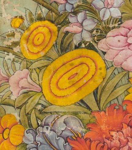 The golden marigolds, however, signify grief and remembrance.
