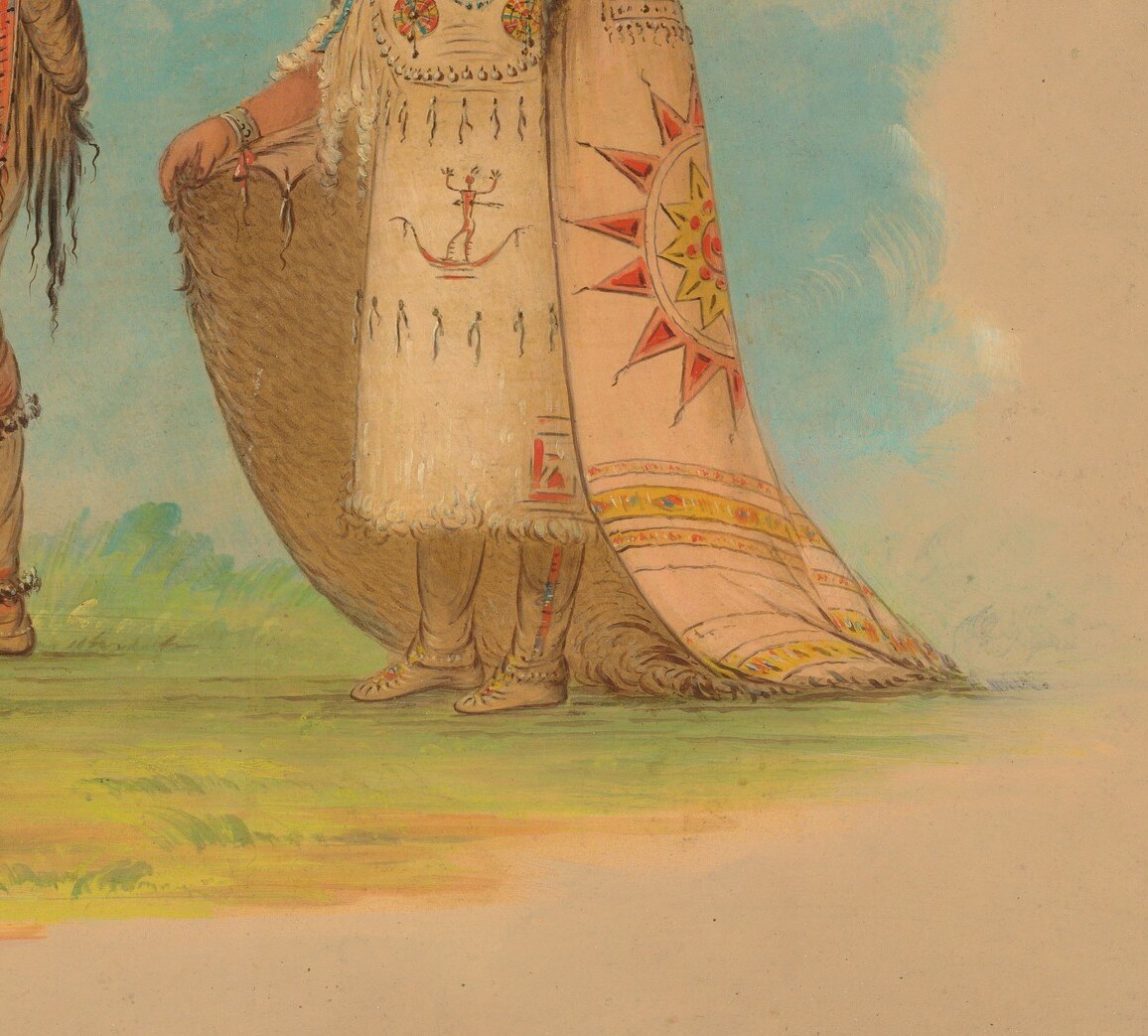 The geometric patterns on her robe offer insight into Riccarree motifs.