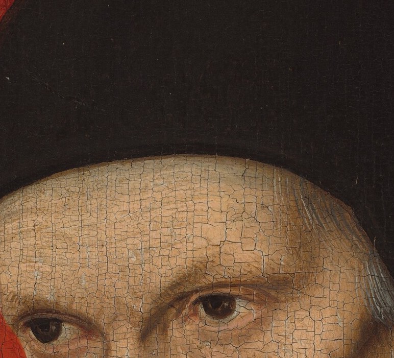His eyes don't quite meet yours. They look inward, past everything.