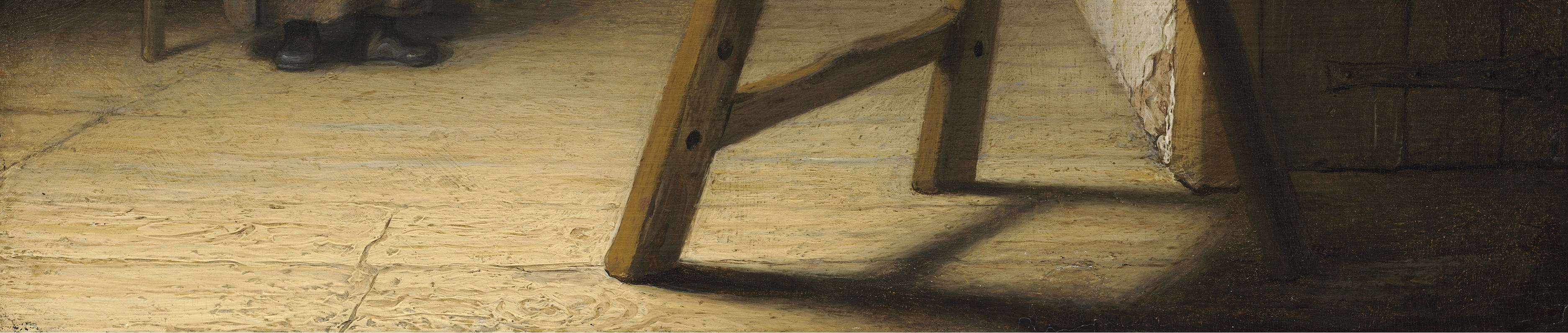 The uneven, worn floor suggests a lived-in, working environment, grounding the scene.