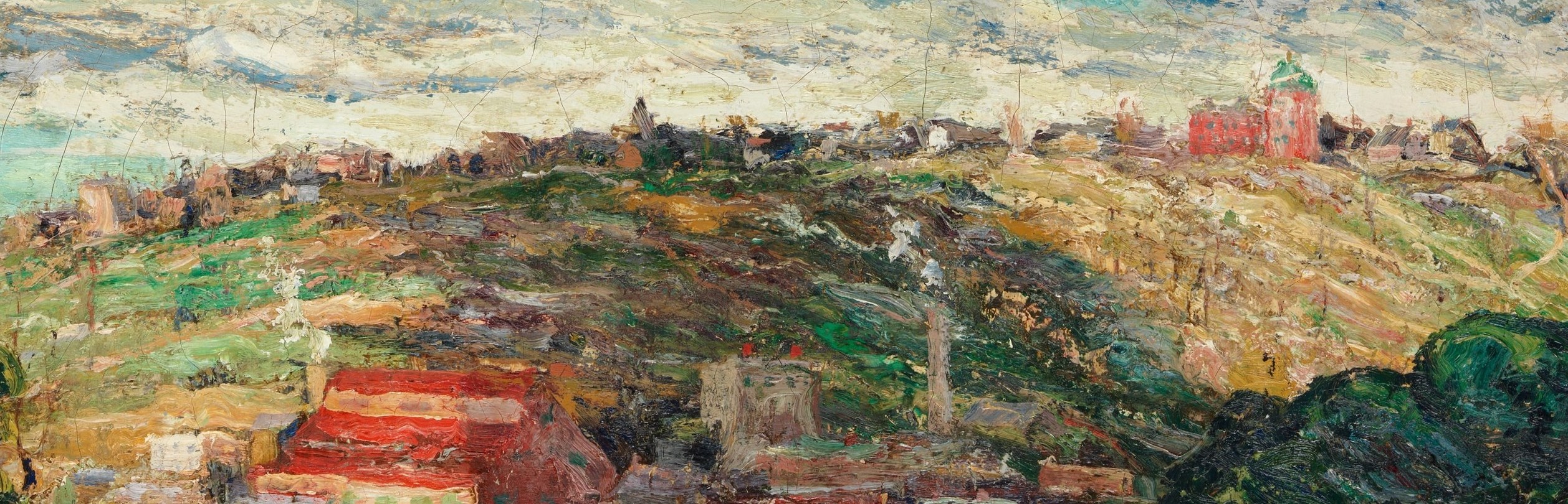 A distant cityscape sits on the ridge.