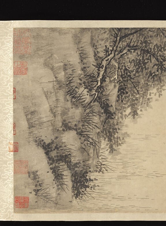 The gravitational anchor of the composition; its scale dwarfs the fisherman and makes solitude tangible.