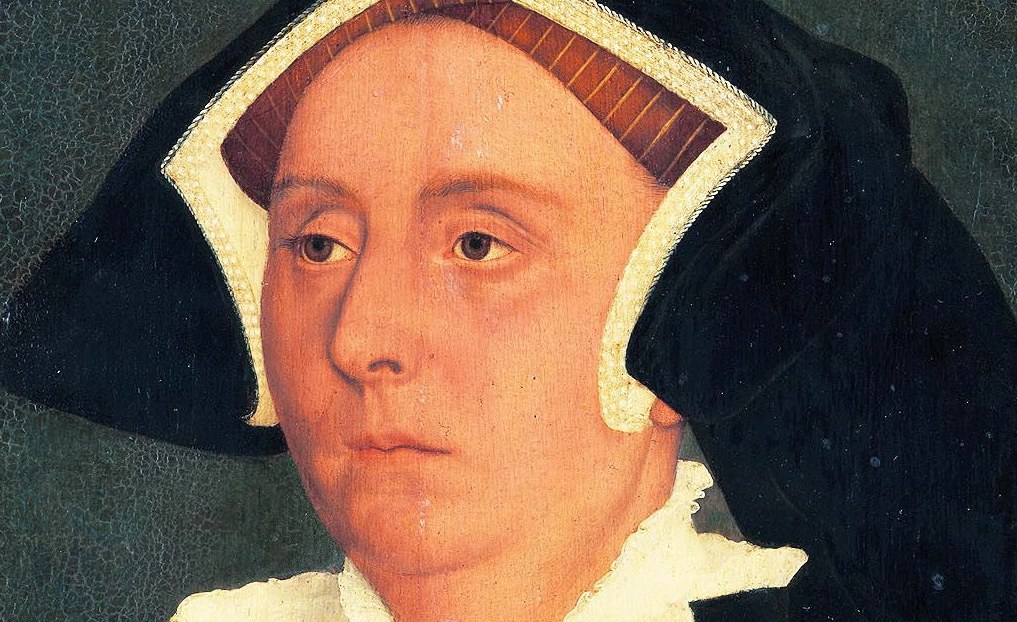 The voluminous black fabric frames her face, emphasizing her status and the fashion of the era.