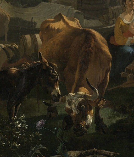 A large bull anchors the foreground, patiently waiting.