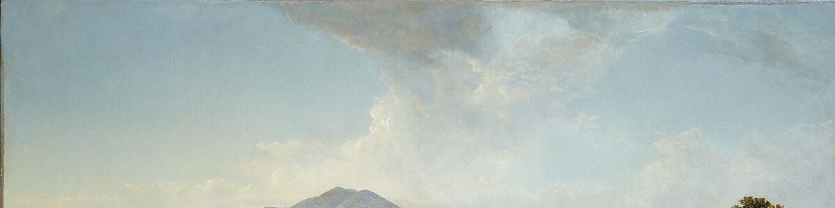 Clouds mirror the mountain's rounded form below , a visual rhyme linking sky and earth that gives the composition its quiet coherence.