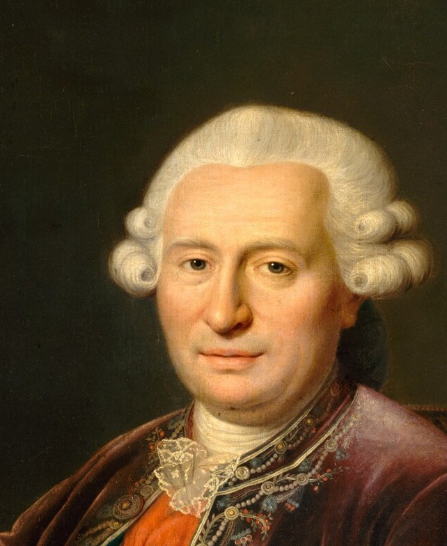 His direct gaze and slight smile suggest confidence and perhaps a hint of amusement, drawing the viewer into his world.