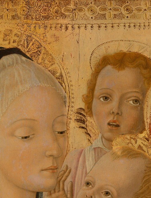 The infant gestures outward with one hand , a benediction pose that reframes a baby's ordinary reach as a cosmic act; the contrast between chubby flesh and theological weight is the core tension of the image.