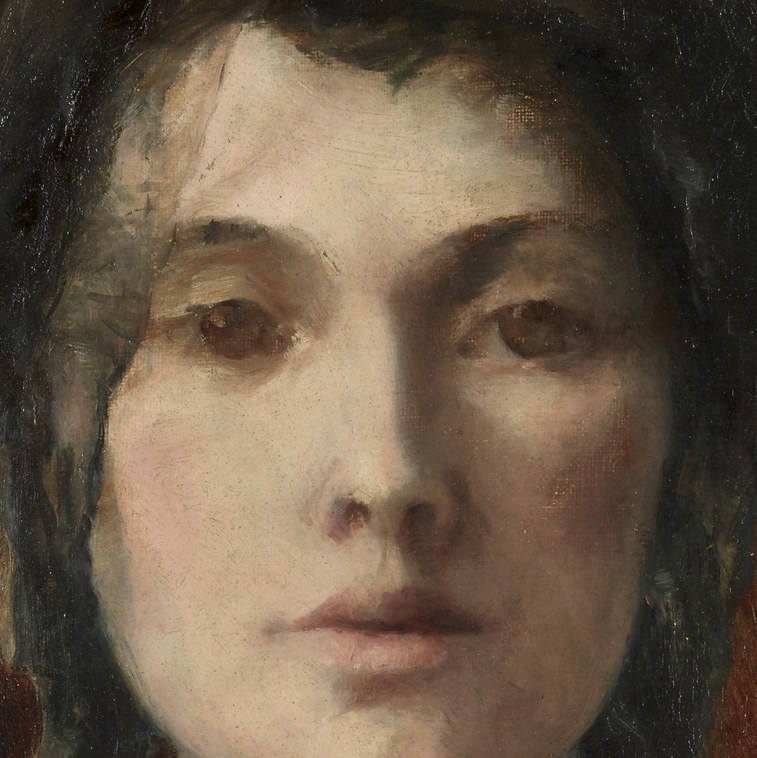 Her gaze is direct yet melancholic.