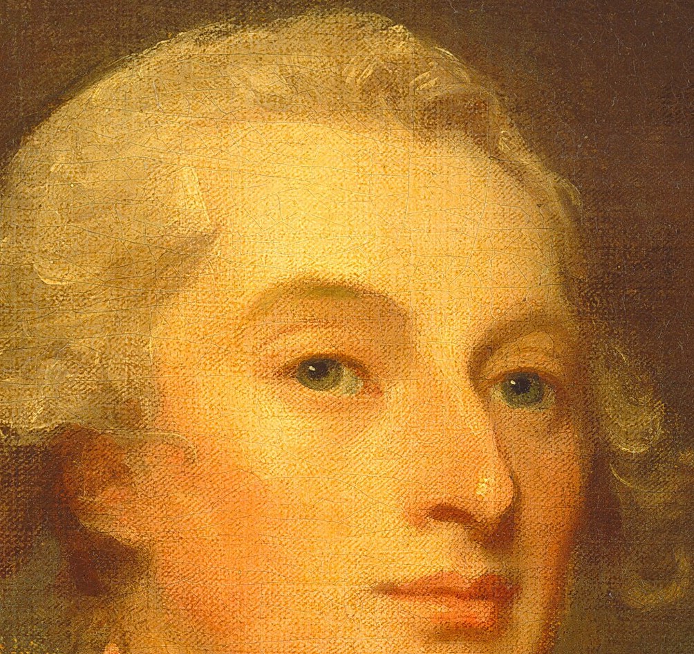 His powdered and curled hair was a sign of status then.