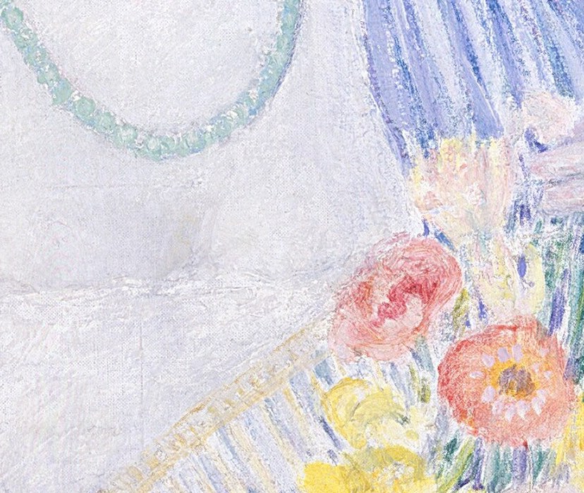 Here, a woman quietly arranges a basket of fresh flowers.
