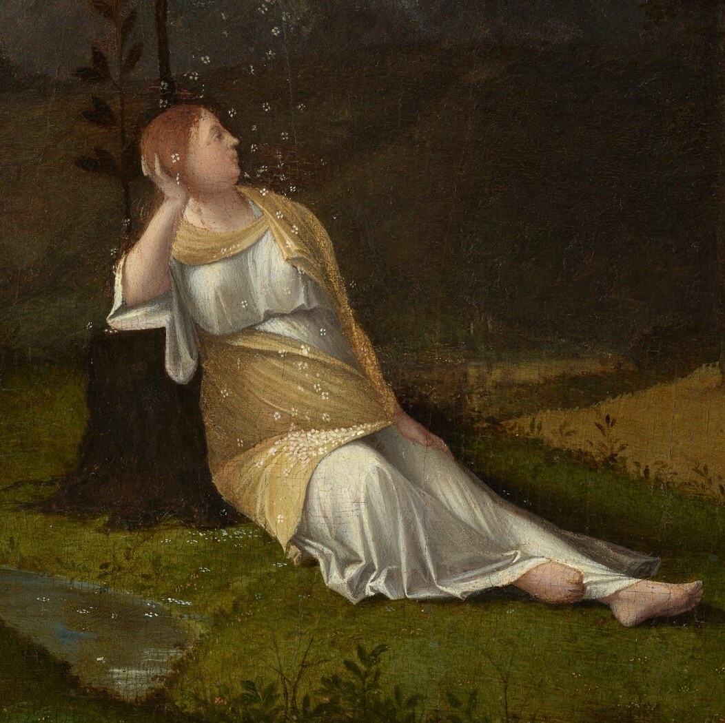 A woman reclines by a tree, draped in white and gold fabric.