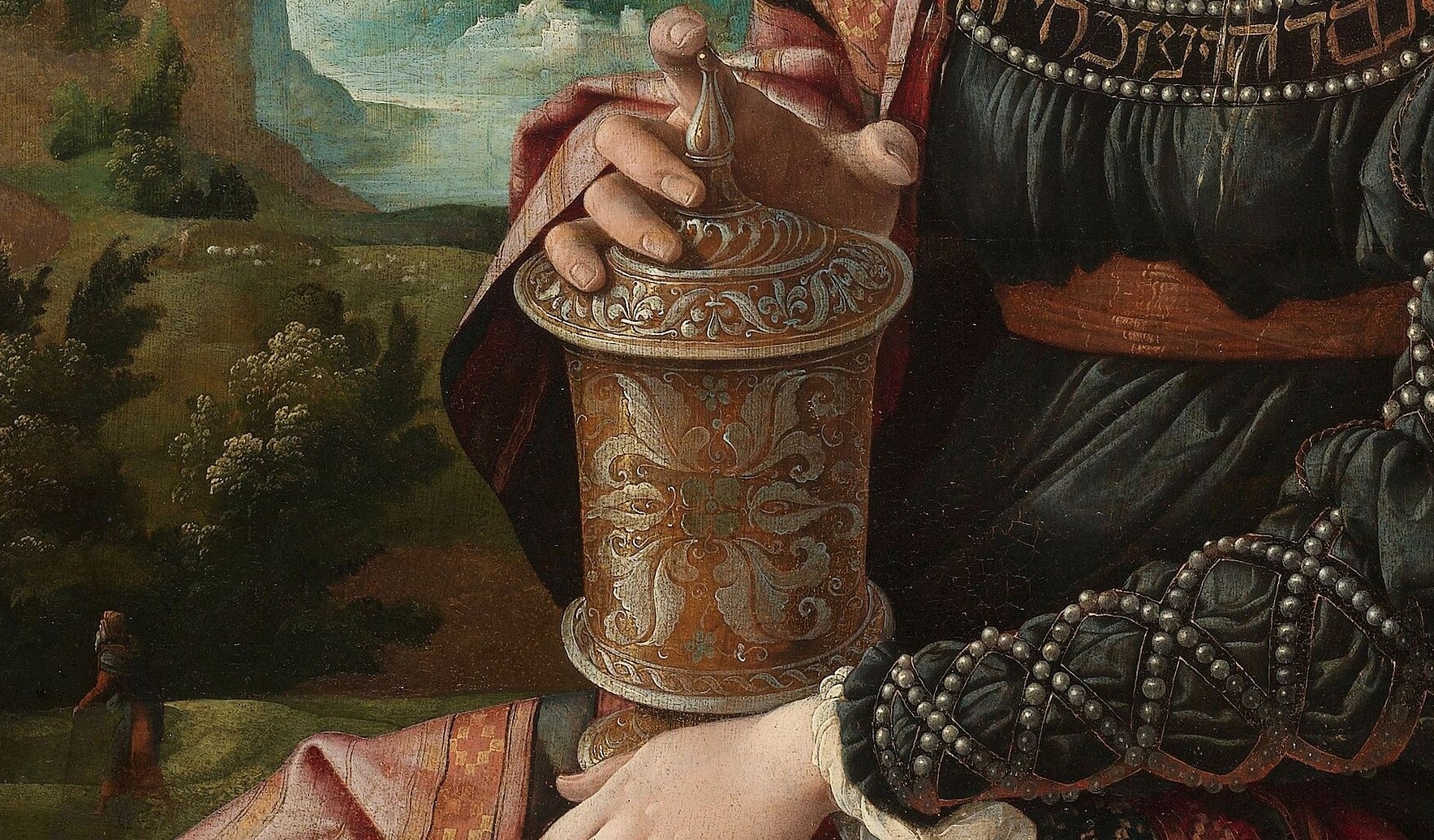 The two-handed reverent grip conveys sacred custody; van Scorel renders the fingers with individuated care that rewards a slow close-up , tension and tenderness coexist in the same gesture.
