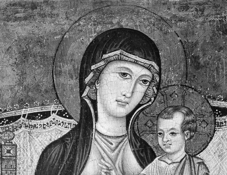 The gold leaf of her halo cost more than the painter's labor.