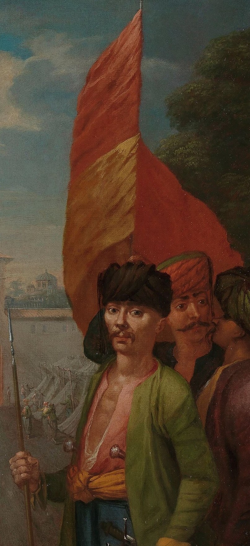 The prominent flag suggests a rallying point for the rebels and adds a dramatic visual element.