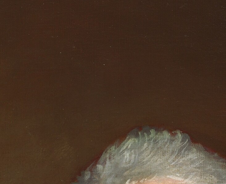 Look closely at his eyes, they seem to hold a secret.