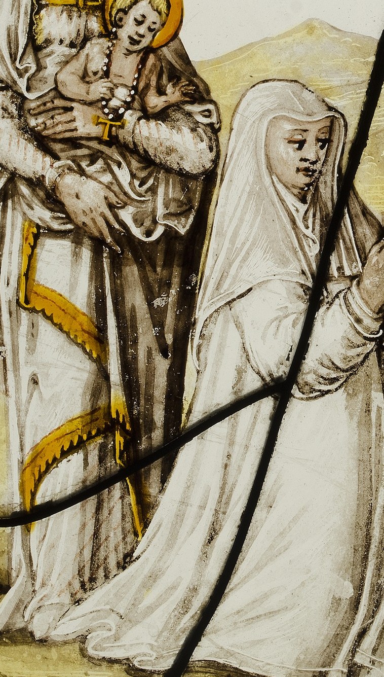 A Carmelite nun stands between the donor and the Virgin.