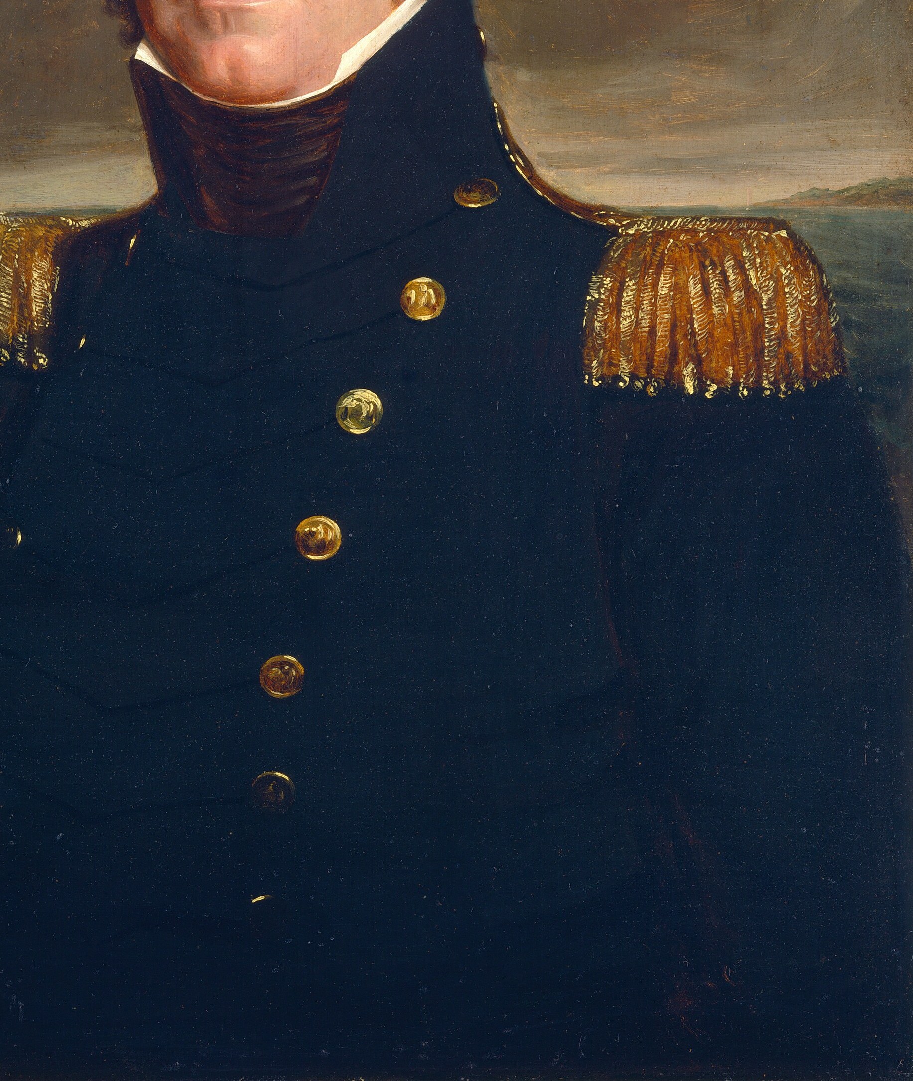 His dark uniform, rich with gold, signals his high rank.