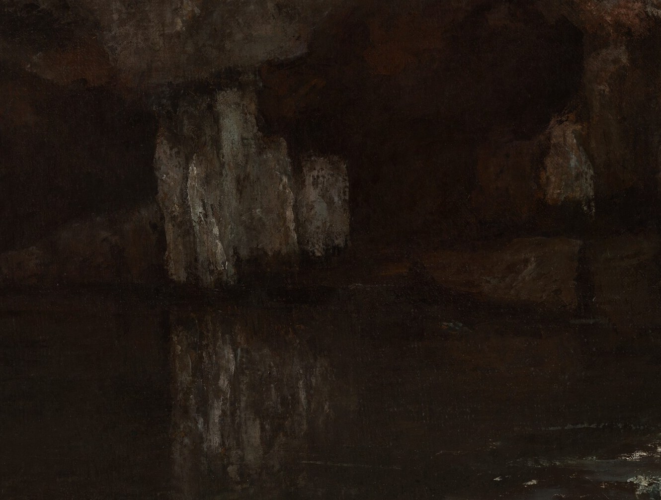 Notice the dramatic light and shadow in the cave's depths.