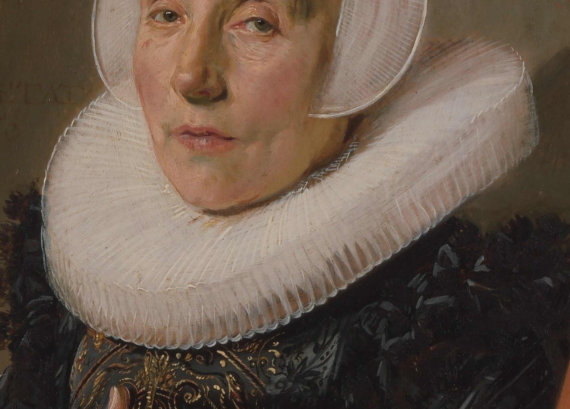 Her collar is stiff, starched, and impossibly wide.