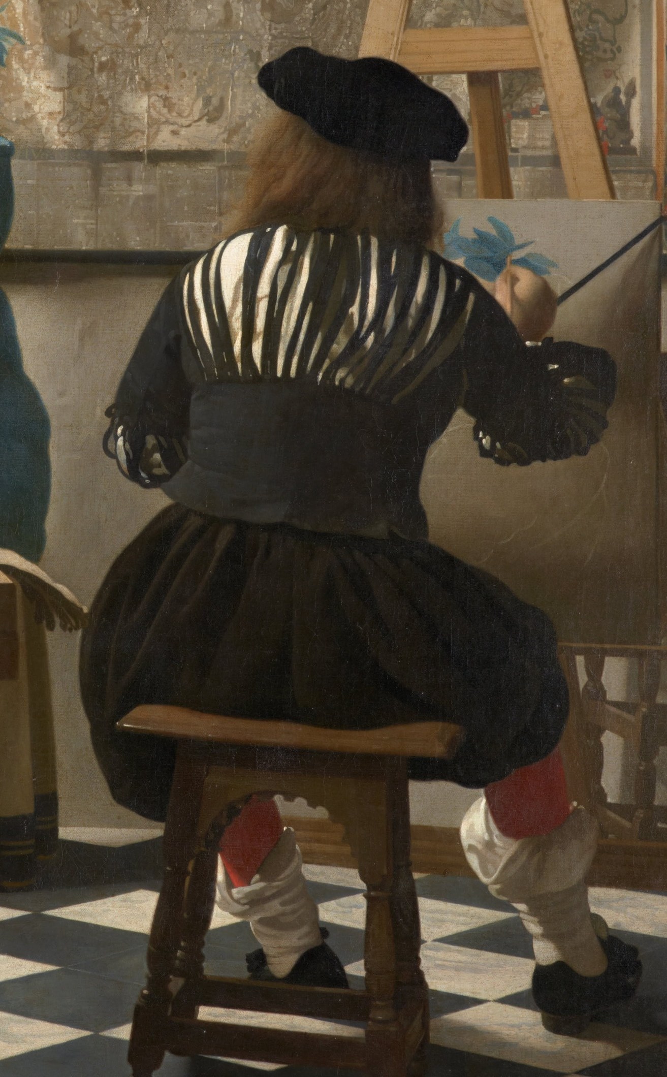 Look at the painter, his back to us.