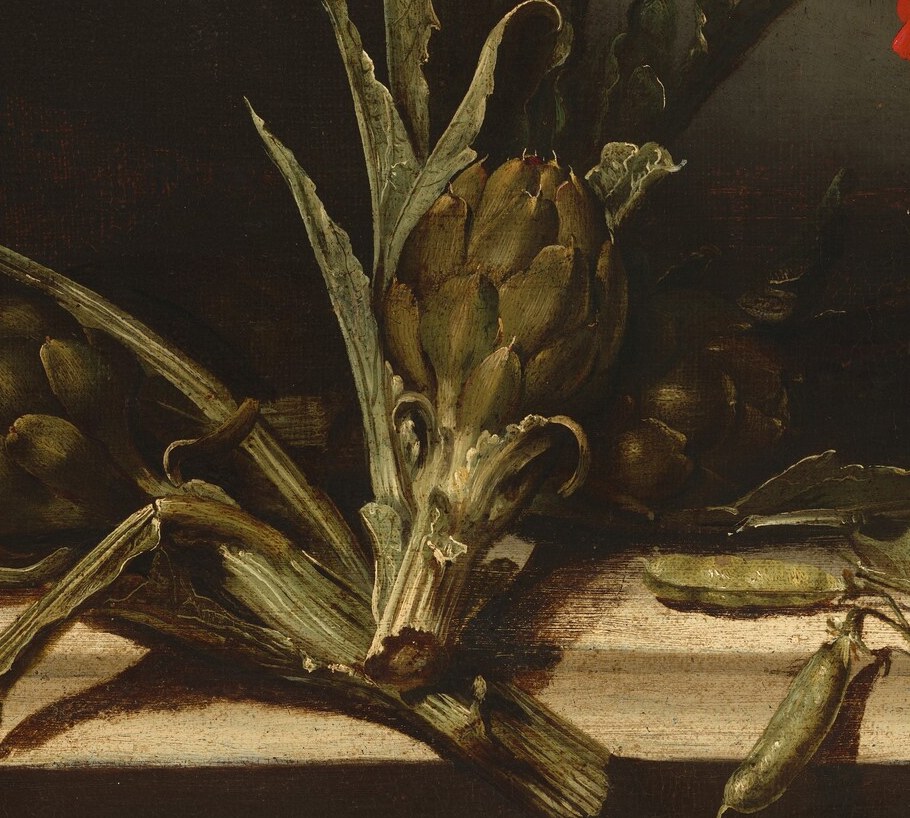 Nearby, the subtle texture of spiky artichokes contrasts with the bird.