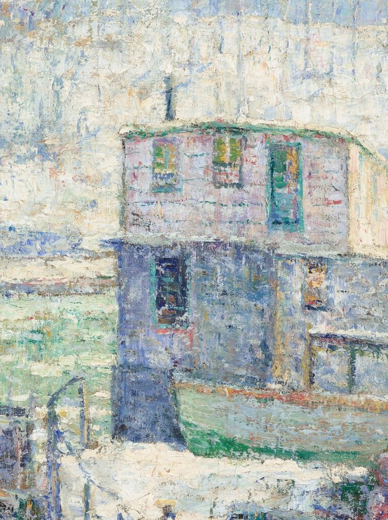 This weathered structure is the focal point, suggesting a working waterfront and human presence in the harsh winter.