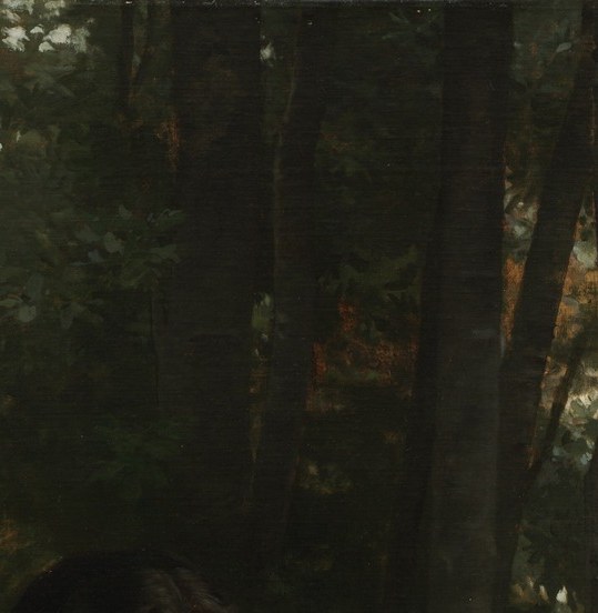 A young mother rests in the shade with her children.