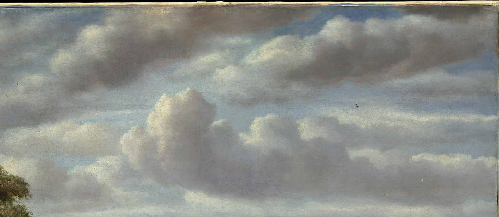 Occupies nearly half the canvas; the sculpted, light-struck upper masses against darker undersides demonstrate Koninck's cloud painting technique and create the painting's drama.