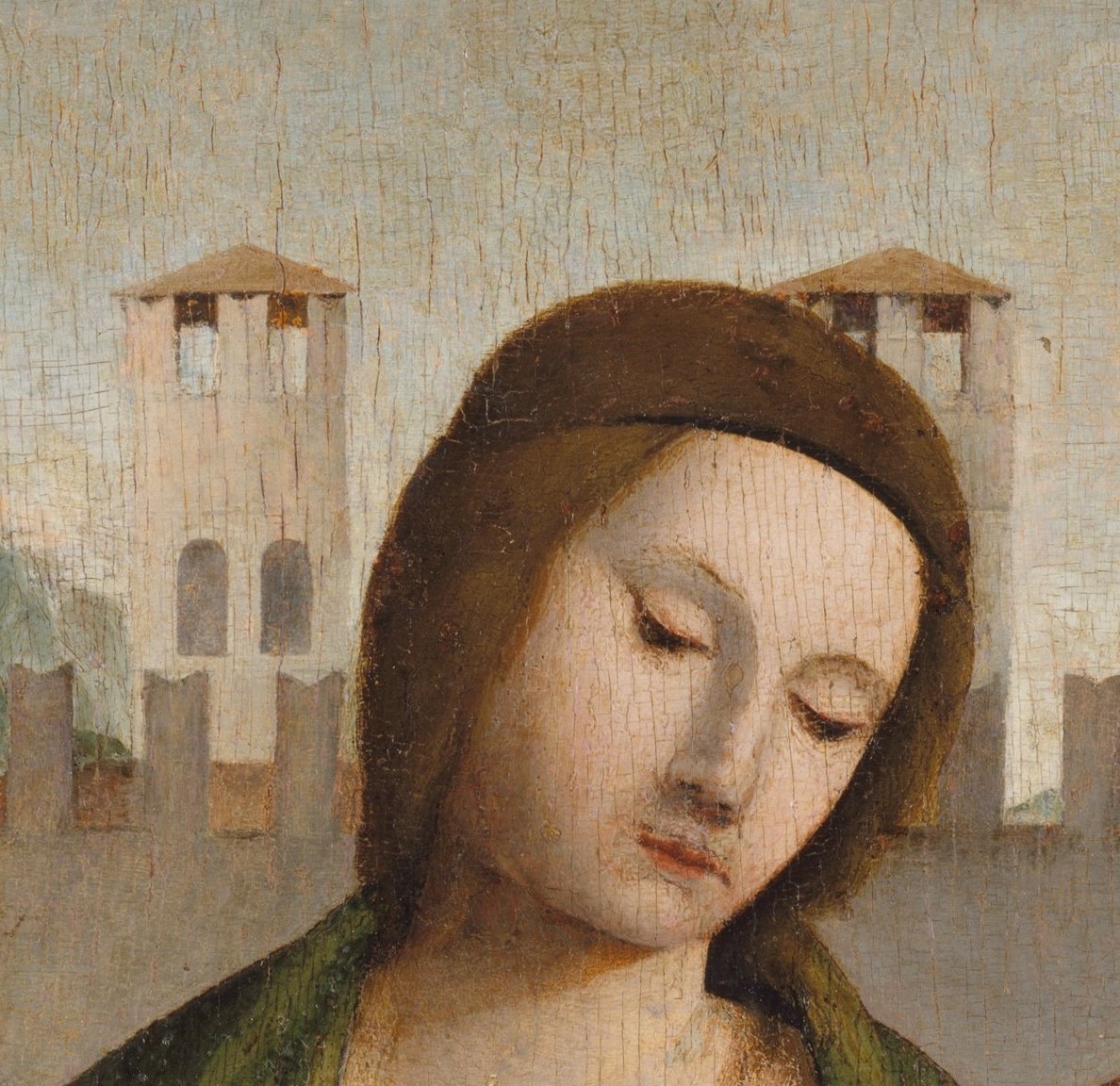 Bramantino's characteristic geometric simplification of volumes is strikingly visible here; the description notes partial repainting, making this face an art-historical puzzle about what is original.