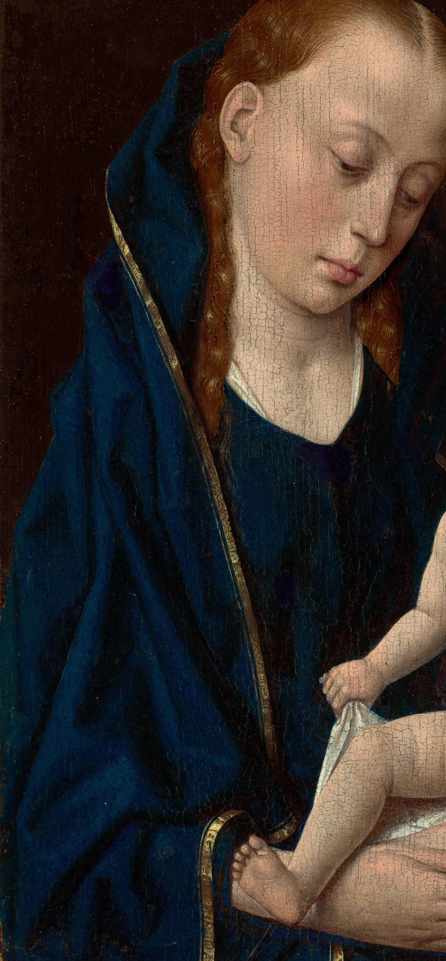 Her mantle is deep ultramarine blue. The most expensive pigment of the 15th century.