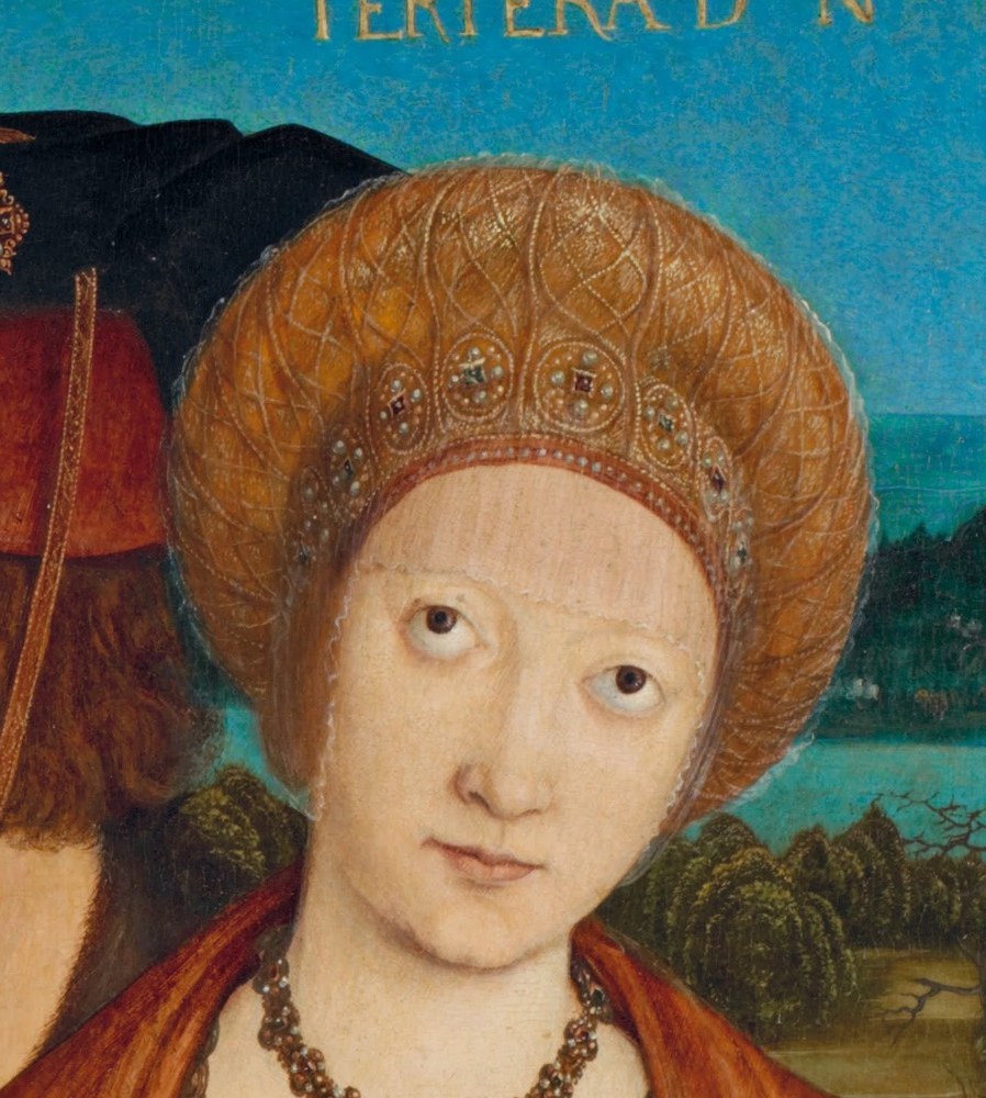 The Empress's gaze holds a hint of melancholy.