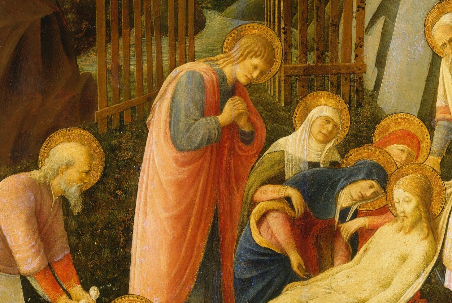 Look at the hands lowering Christ's body.