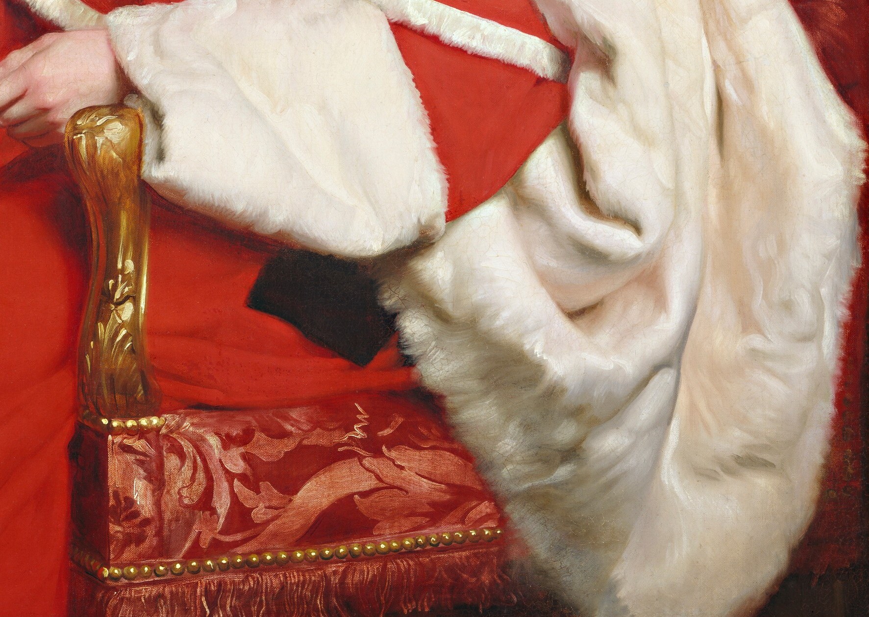 The ornate chair and powdered wig complete his stately presence.
