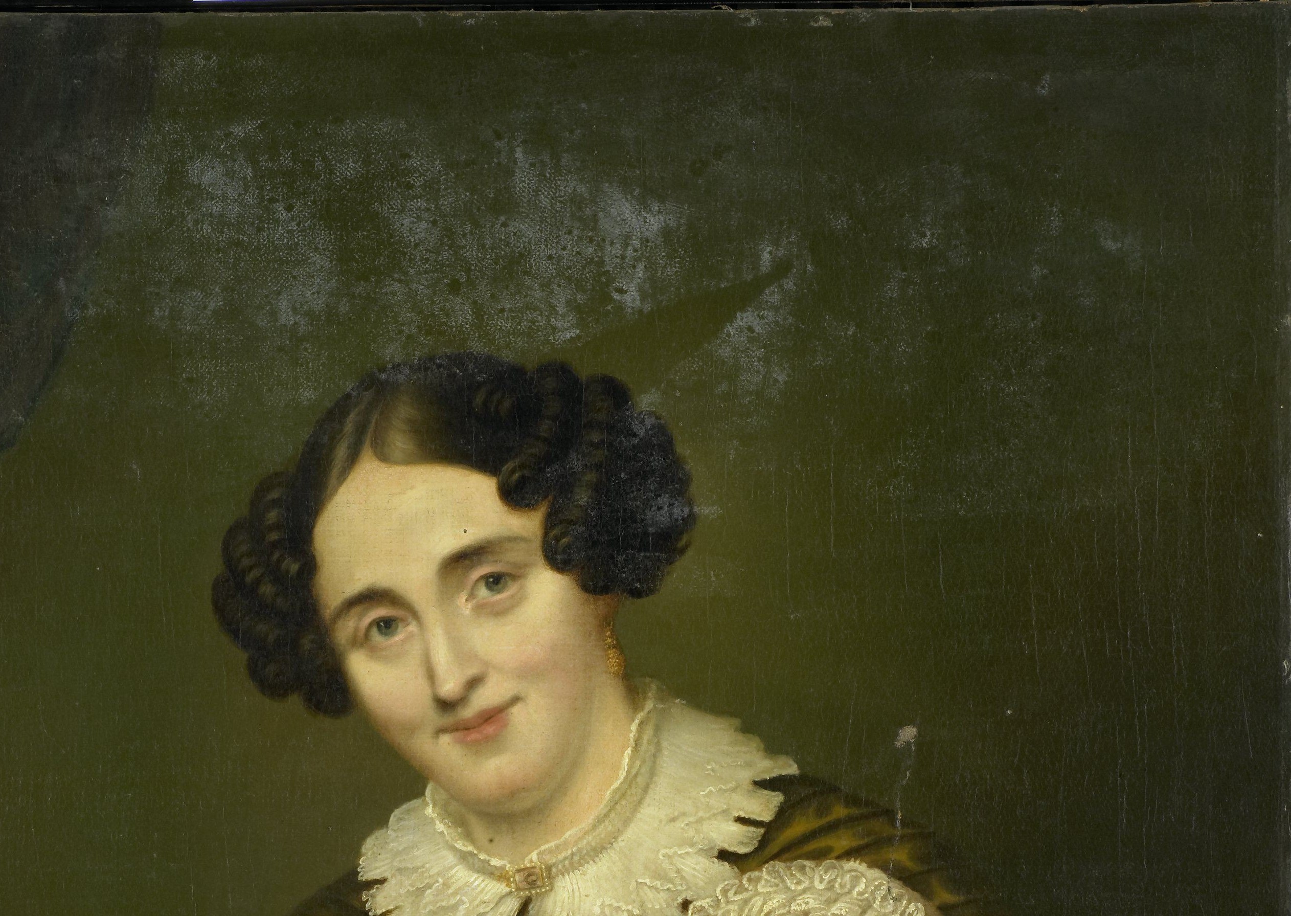 The muted background focuses all attention on the sitters.