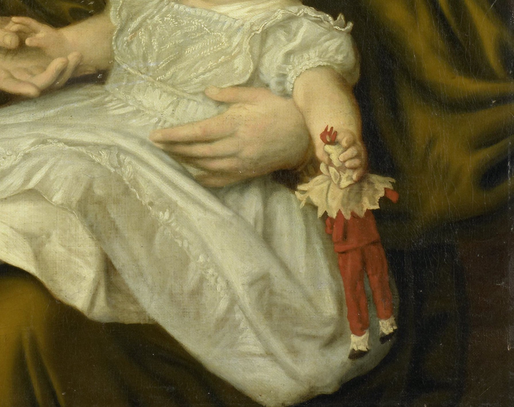 The child's elaborate lace gown was a symbol of their delicate status.