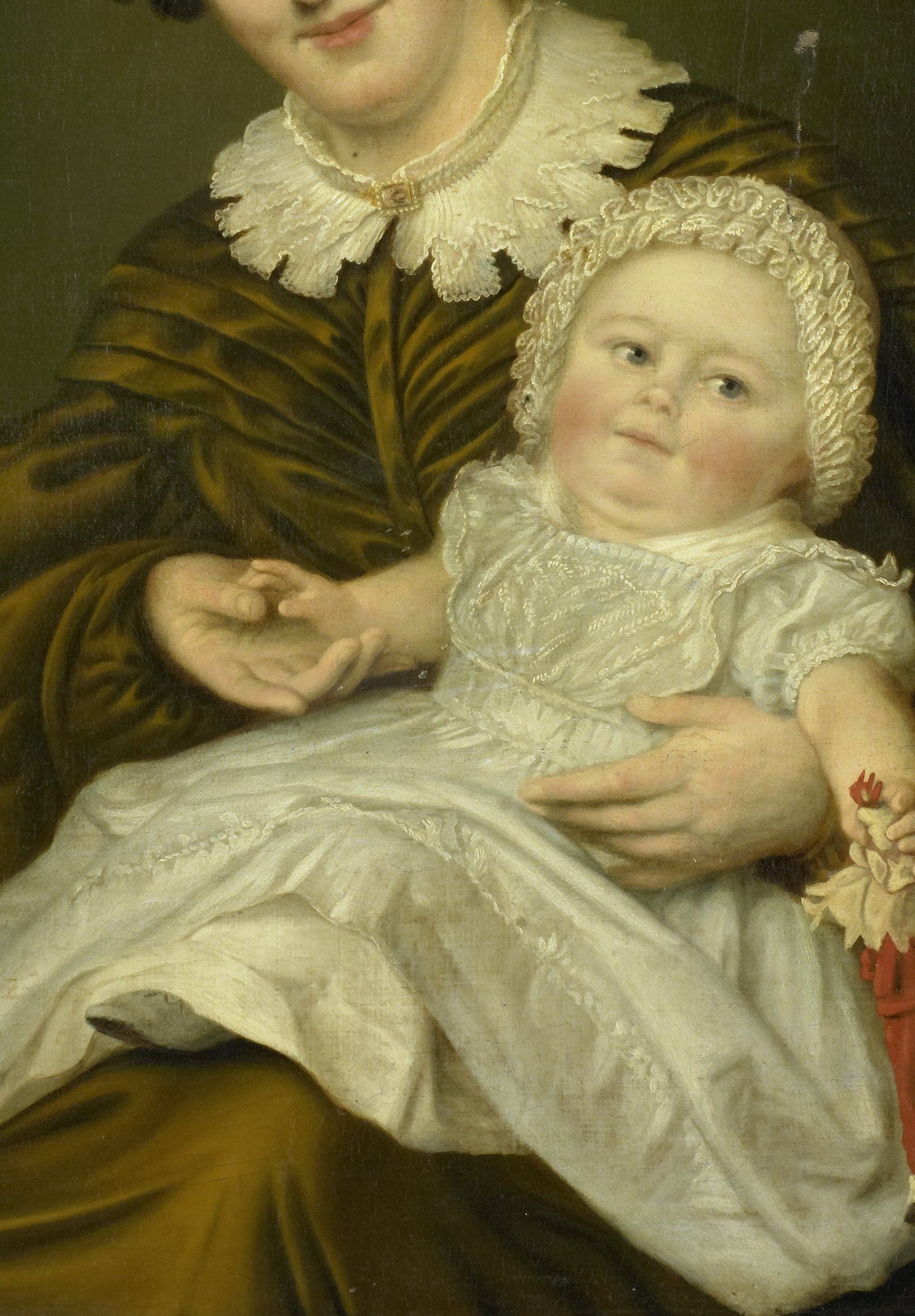 Her dress, with its rich texture, suggests wealth and status.