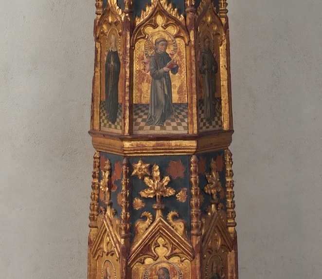 Hidden inside the arches: three tiny painted panels.