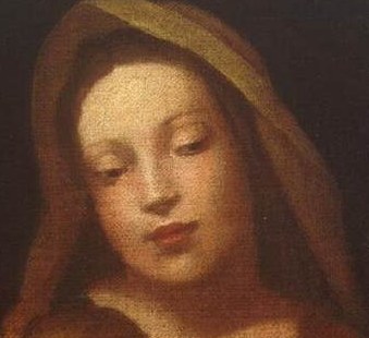 Her gaze is directed downwards, conveying maternal tenderness and a sense of divine contemplation.