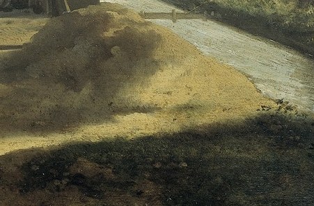 Men dig and move earth, strengthening their city's defenses.