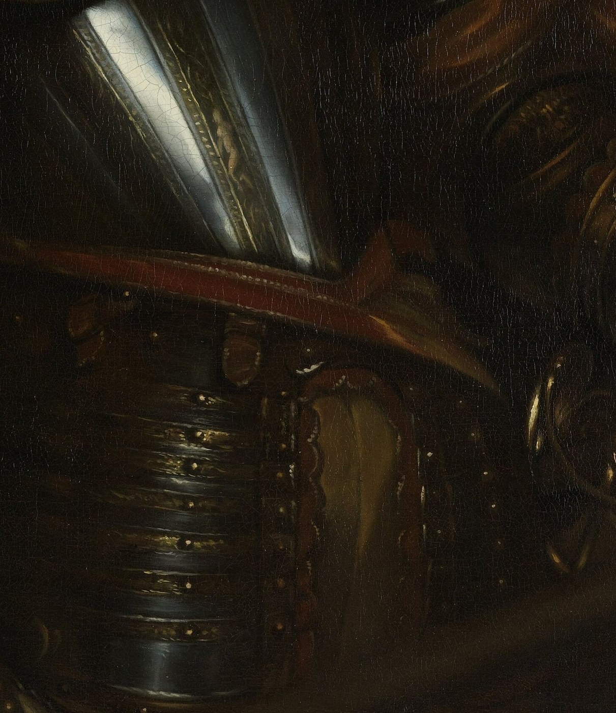 His armor shows his martial role and noble status.