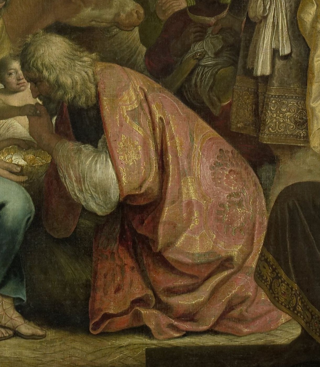 His opulent robes show the wealth of the East.