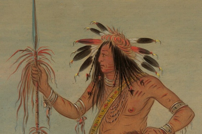 This headdress, with its prominent feathers and adornments, emphasizes the warrior's authority.