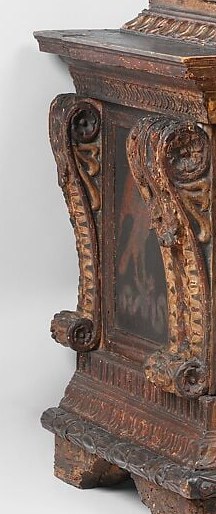 Vertical carved column flanking the painted panel , original mid-15th-century Florentine joinery that situates the painting in domestic display context; its survival is part of what makes this cassone rare.