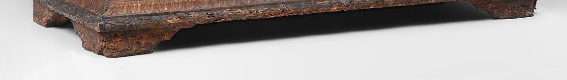 The polychromed base retains original Strozzi family emblems (hawk perched on a caltrop) on the end pieces , the heraldic evidence that links the chest's original commission to a specific Florentine dynasty.