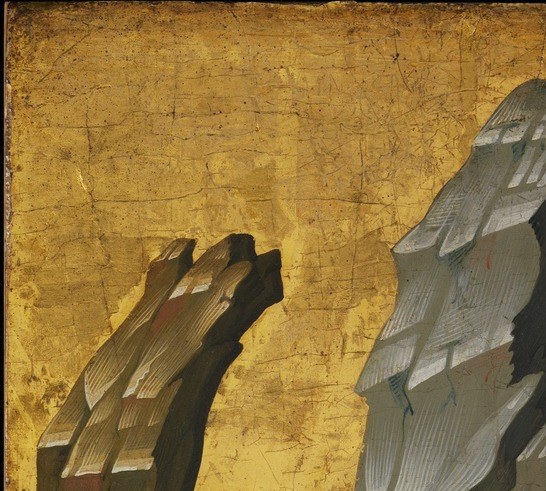 They march him through a landscape of solid gold.