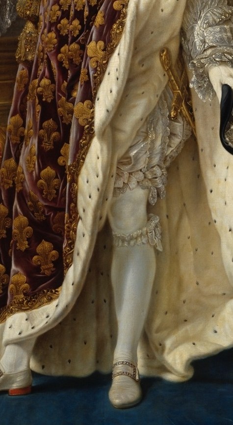 Like the fleur-de-lis on his robe.