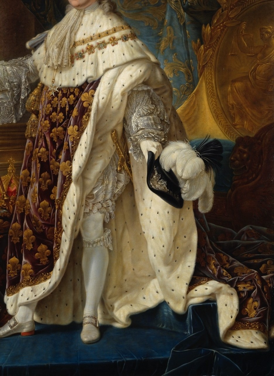 He is surrounded by symbols of royal power.
