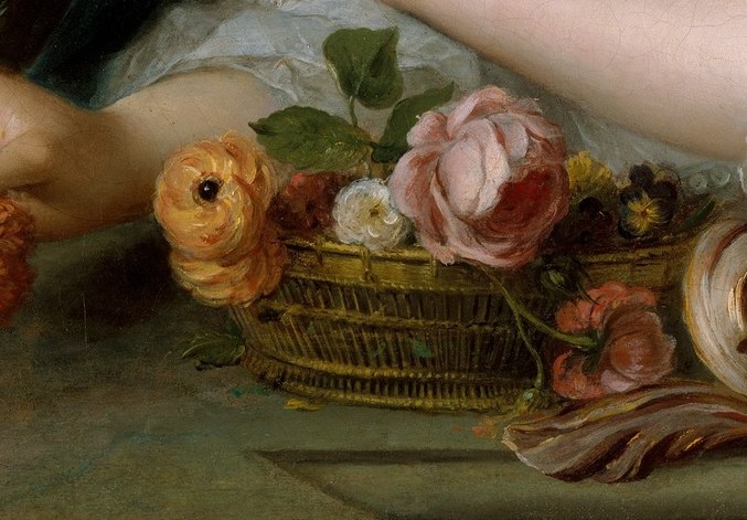 The flowers in her basket signify abundance and beauty.