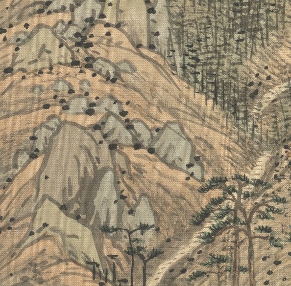 But look closely, here at the base of the mountain.